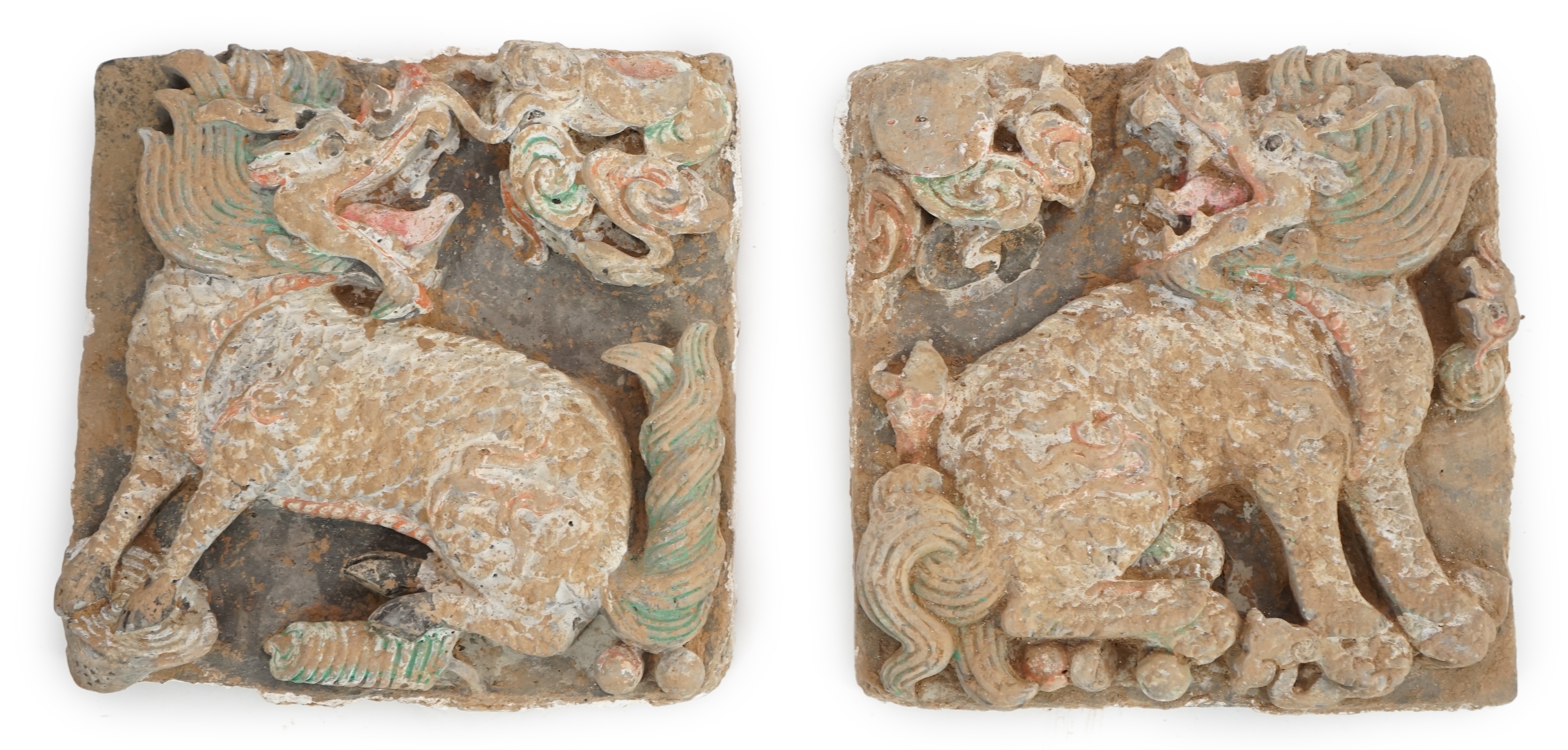 A fine pair of large Chinese painted pottery ‘Qilin, Sun and Moon’ tiles, Ming Dynasty (1368-1644)